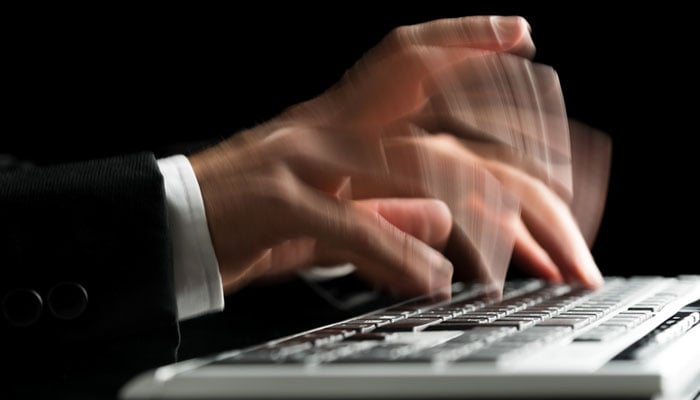 blurred-hands-typing-web.jpg