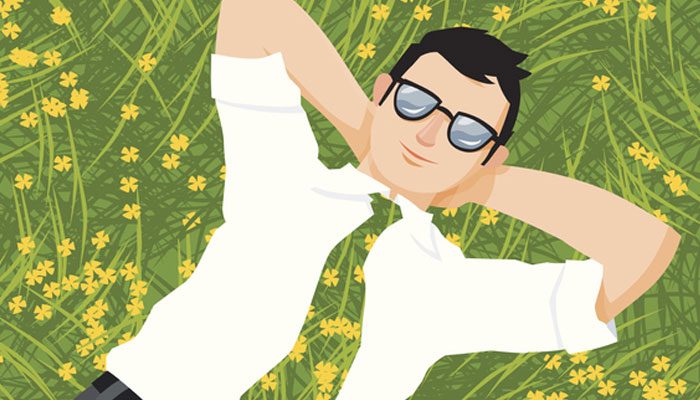 business-guy-lying-in-grassy-field.jpg